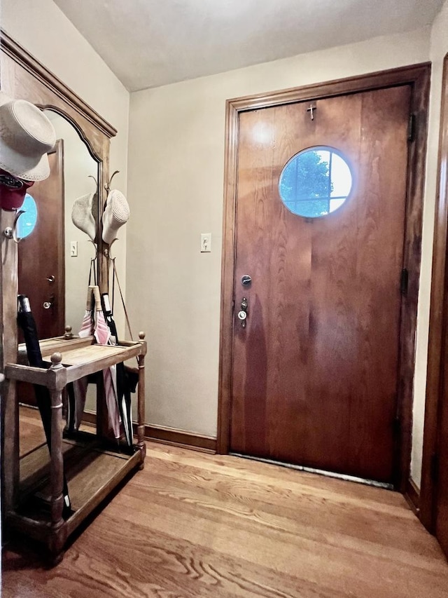 9214 S Sacramento Ave, Evergreen Park, IL 60805 - foyer entrance featuring wood finished floors and baseboards