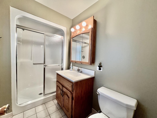 9214 S Sacramento Ave, Evergreen Park, IL 60805 - full bath with vanity, toilet, a shower stall, and tile patterned flooring