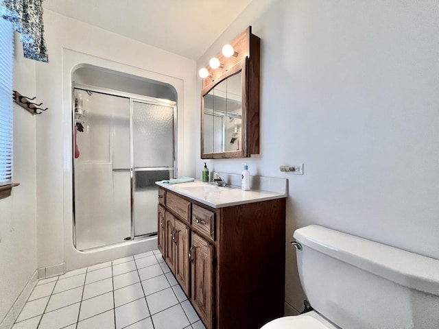 9214 S Sacramento Ave, Evergreen Park, IL 60805 - full bathroom featuring vanity, a shower stall, toilet, and tile patterned flooring