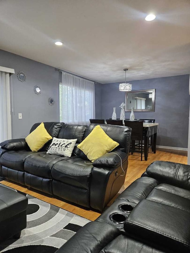 441 Commanche Trl, Wheeling, IL 60090 - living room featuring wood finished floors, a chandelier, recessed lighting, and baseboards