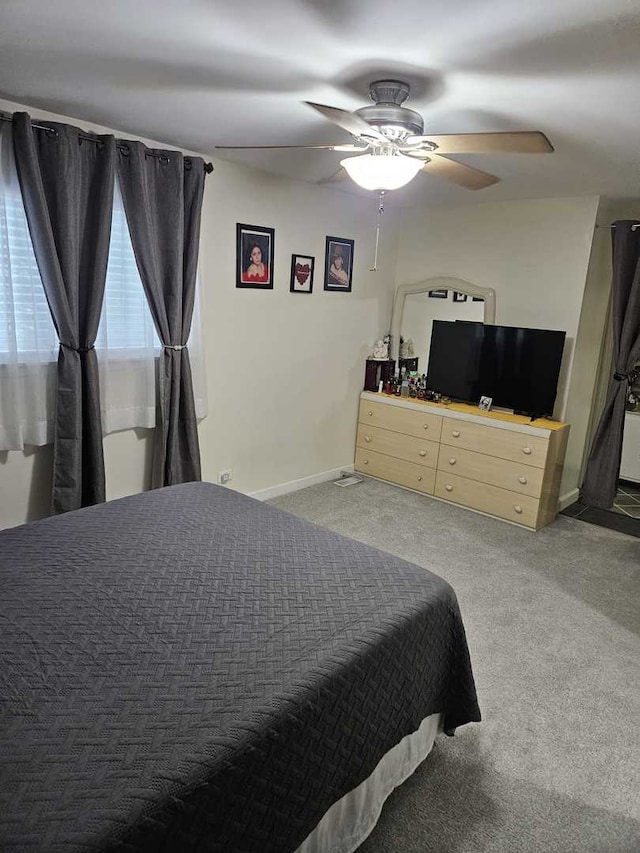 441 Commanche Trl, Wheeling, IL 60090 - carpeted bedroom with baseboards and ceiling fan