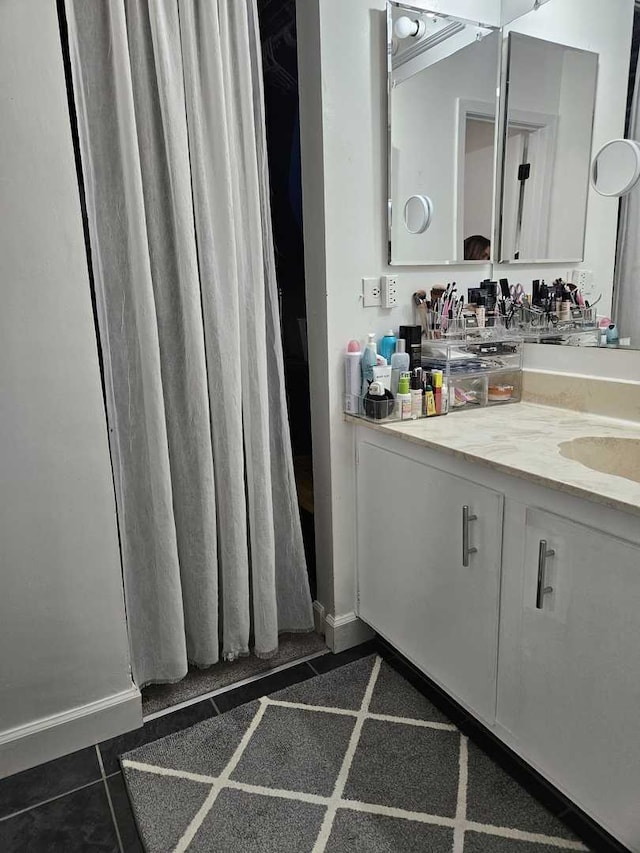 441 Commanche Trl, Wheeling, IL 60090 - bathroom with vanity, tile patterned flooring, and baseboards
