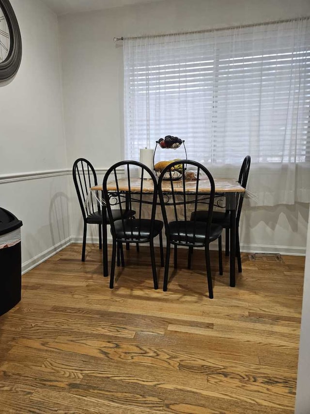 441 Commanche Trl, Wheeling, IL 60090 - dining space with baseboards and wood finished floors