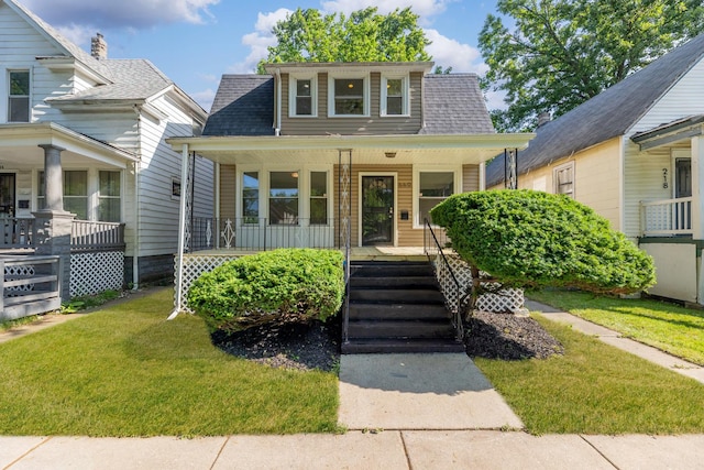 220 W 109th Pl, Chicago, IL 60628 - view of front of house featuring a porch, a front yard, and a shingled roof