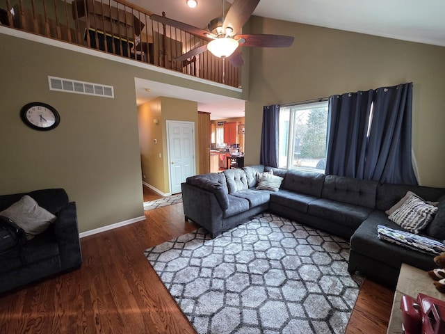 3331 Banford Cir, Lake In The Hills, IL 60156 - living room with high vaulted ceiling, wood finished floors, ceiling fan, and baseboards