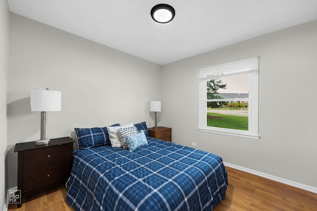 401 Monet Cir, Bolingbrook, IL 60440 - bedroom featuring wood finished floors and baseboards