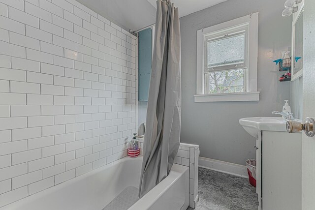 552 Walnut Ave, Elgin, IL 60123 - bathroom featuring vanity, shower / bath combo with shower curtain, and baseboards