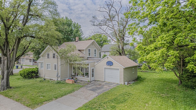 552 Walnut Ave, Elgin, IL 60123 - traditional home with a front yard, driveway, roof with shingles, a chimney, and an attached garage