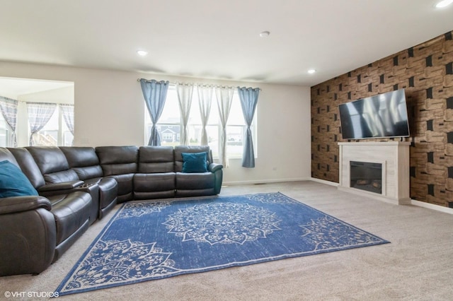 3751 Peregrine Way, Elgin, IL 60124 - carpeted living room with healthy amount of natural light, a glass covered fireplace, recessed lighting, and baseboards