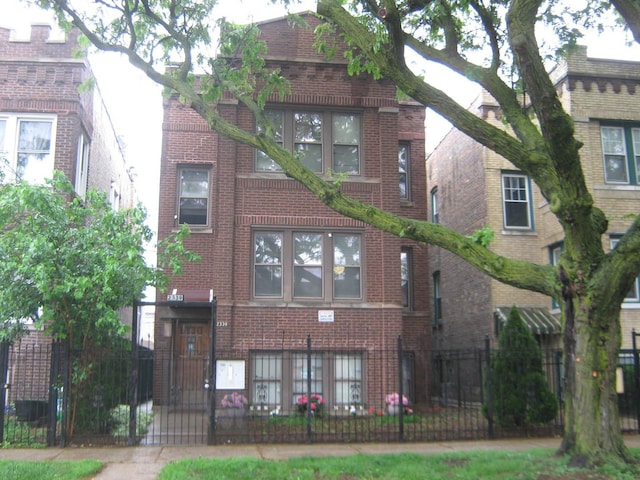 2339 N Kilbourn Ave, Chicago, IL 60639 - view of property featuring a fenced front yard