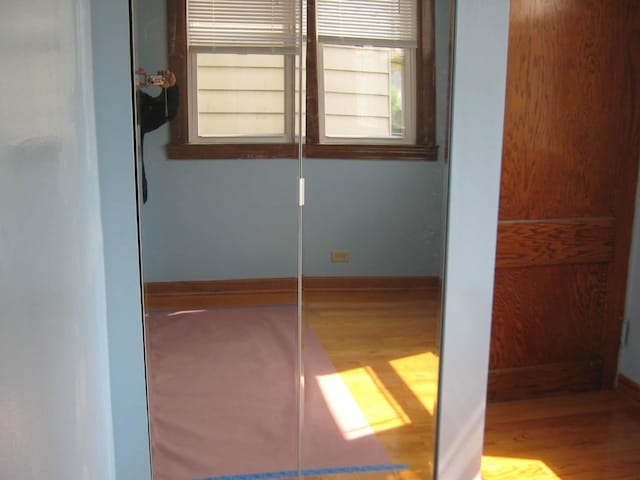 2339 N Kilbourn Ave, Chicago, IL 60639 - hallway with wood finished floors and baseboards