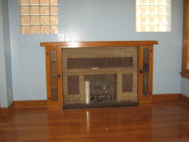 2339 N Kilbourn Ave, Chicago, IL 60639 - detailed view of a fireplace and wood finished floors