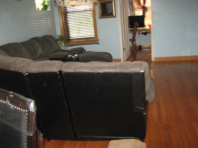 2339 N Kilbourn Ave, Chicago, IL 60639 - living room featuring wood finished floors and baseboards