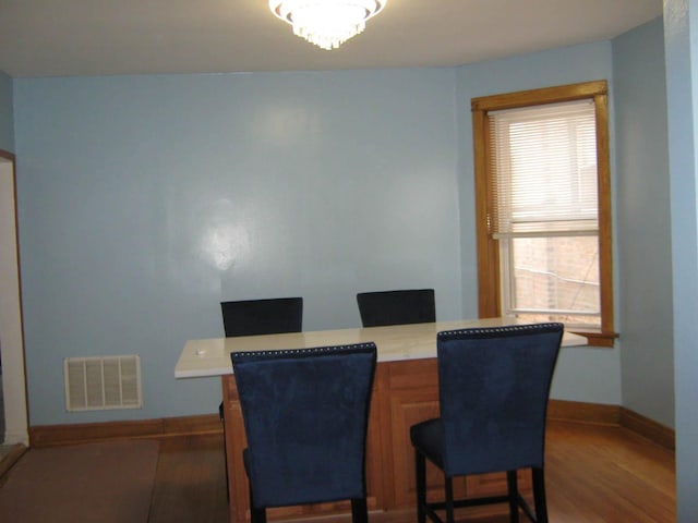 2339 N Kilbourn Ave, Chicago, IL 60639 - dining area featuring wood finished floors and baseboards