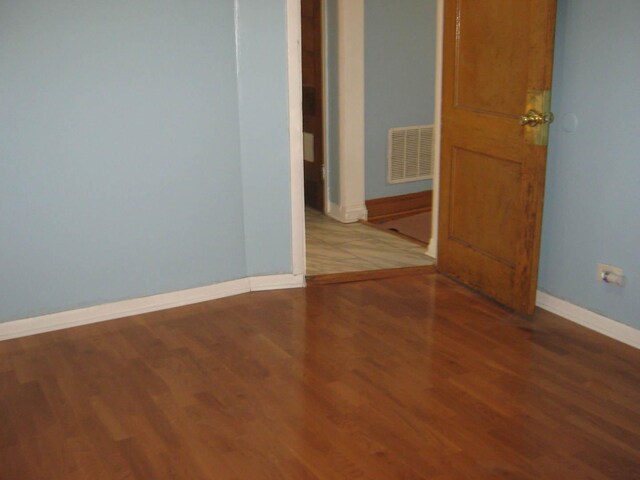 2339 N Kilbourn Ave, Chicago, IL 60639 - empty room featuring wood finished floors