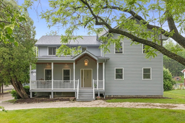 27W268 Hoy Ave, Warrenville, IL 60555 - traditional-style home featuring covered porch and a front yard
