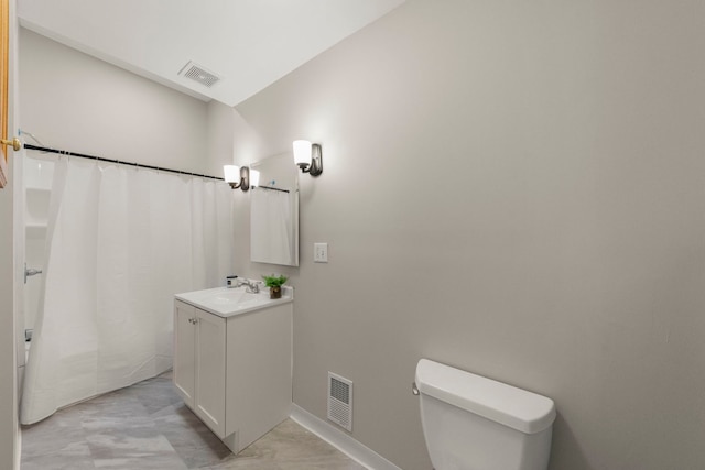 27W268 Hoy Ave, Warrenville, IL 60555 - bathroom with toilet, vanity, and baseboards