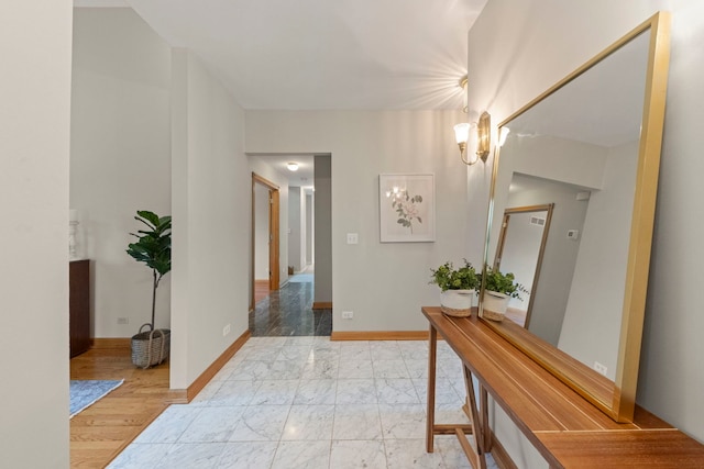 27W268 Hoy Ave, Warrenville, IL 60555 - corridor featuring light marble finish floors and baseboards