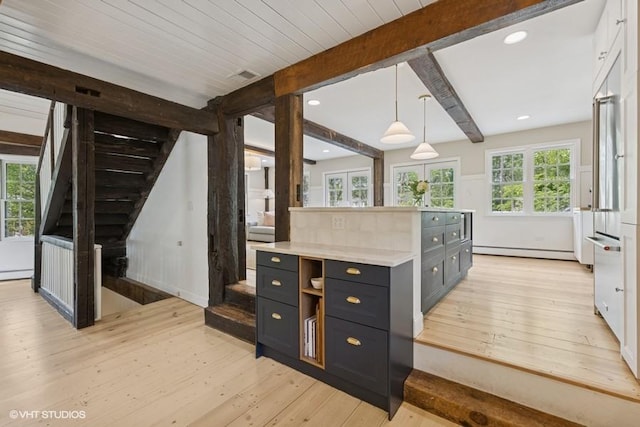 3622 Fairview Ave, Downers Grove, IL 60515 - kitchen featuring light wood-type flooring, beamed ceiling, light countertops, dark cabinetry, and a baseboard heating unit