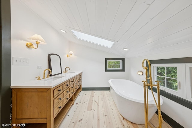 3622 Fairview Ave, Downers Grove, IL 60515 - bathroom with a skylight, lofted ceiling, wood-type flooring, wooden ceiling, and a freestanding tub