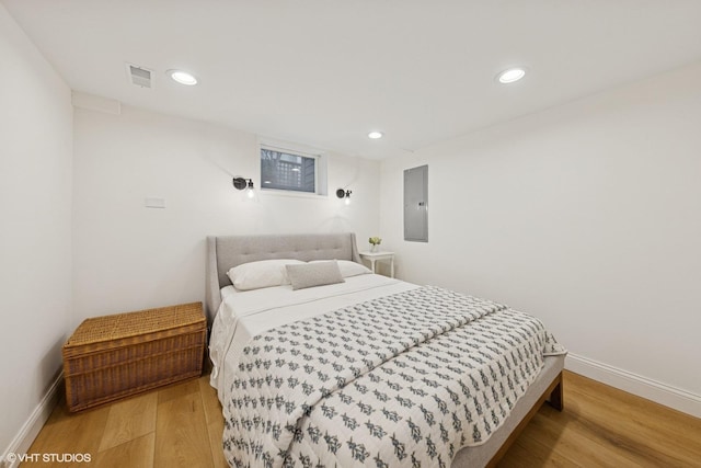3622 Fairview Ave, Downers Grove, IL 60515 - bedroom featuring electric panel, wood finished floors, and recessed lighting