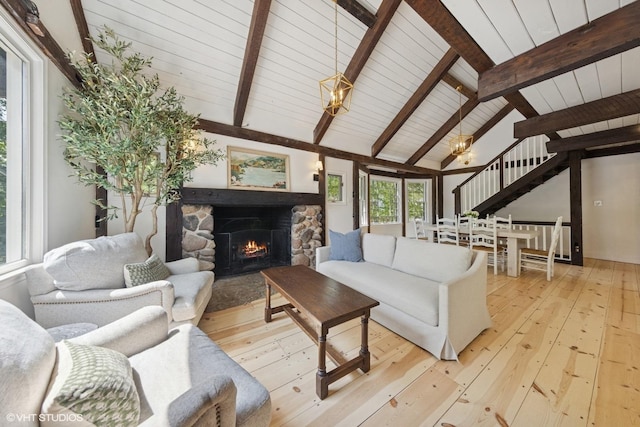 3622 Fairview Ave, Downers Grove, IL 60515 - living room with stairs, healthy amount of natural light, light wood finished floors, beam ceiling, and a fireplace