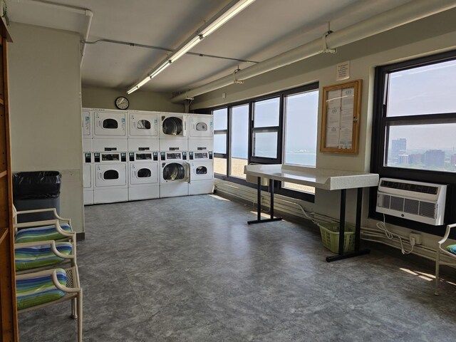 6700 S S Shore Dr Unit 18K, Chicago, IL 60649 - communal laundry room featuring stacked washer and clothes dryer