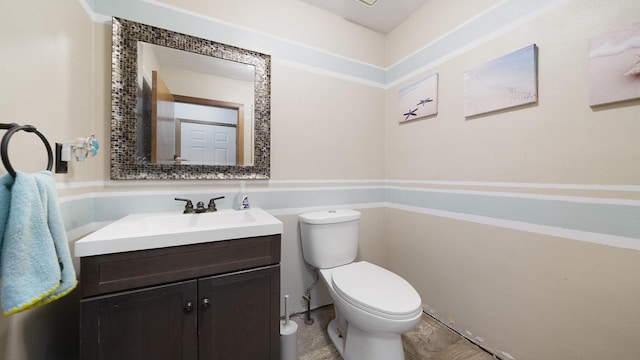 10129 Asbury Ln, Machesney Park, IL 61115 - half bath featuring vanity and toilet