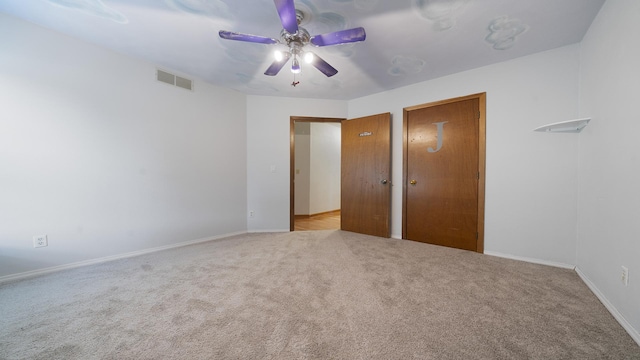 10129 Asbury Ln, Machesney Park, IL 61115 - unfurnished bedroom featuring carpet flooring, baseboards, and ceiling fan