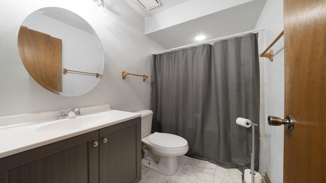 10129 Asbury Ln, Machesney Park, IL 61115 - full bath with marble look tile flooring, vanity, toilet, and a shower with curtain