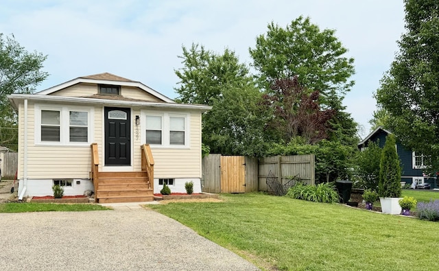 1327 N Pleasant Dr, Round Lake Beach, IL 60073 - view of front of house with entry steps and a gate
