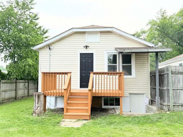 1327 N Pleasant Dr, Round Lake Beach, IL 60073 - back of property featuring a wooden deck