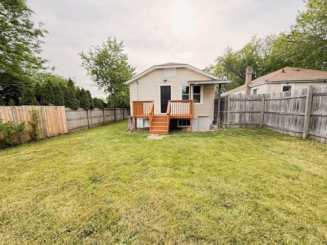 1327 N Pleasant Dr, Round Lake Beach, IL 60073 - rear view of property with a wooden deck