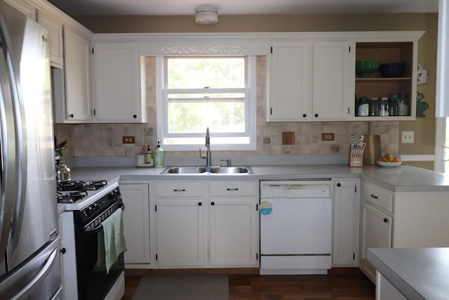 1900 Waverly Ln, Algonquin, IL 60102 - kitchen with dishwasher, freestanding refrigerator, a sink, gas range, and decorative backsplash