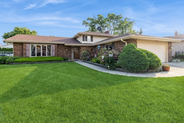 1243 W Byron Ave, Addison, IL 60101 - tri-level home with brick siding, an attached garage, a front yard, and driveway