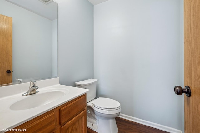 955 S Roxbury Ct, Round Lake, IL 60073 - half bath featuring wood finished floors and vanity