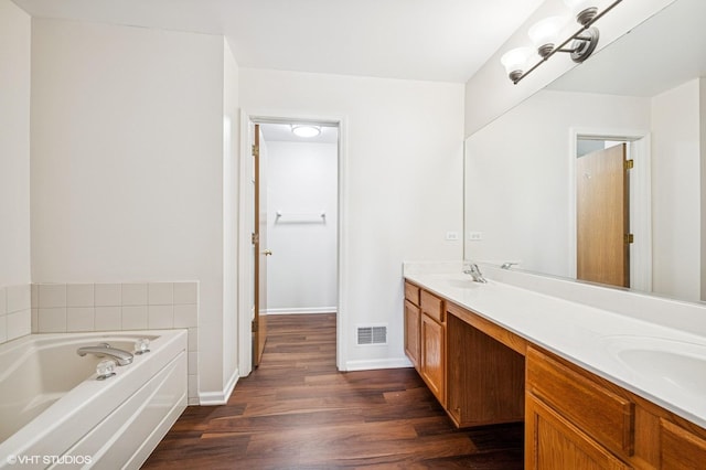 955 S Roxbury Ct, Round Lake, IL 60073 - full bath featuring wood finished floors, double vanity, and a bath