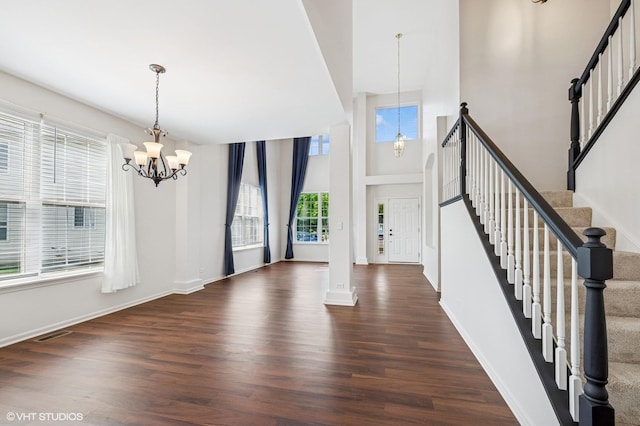 955 S Roxbury Ct, Round Lake, IL 60073 - foyer featuring a chandelier, wood finished floors, stairs, and a high ceiling
