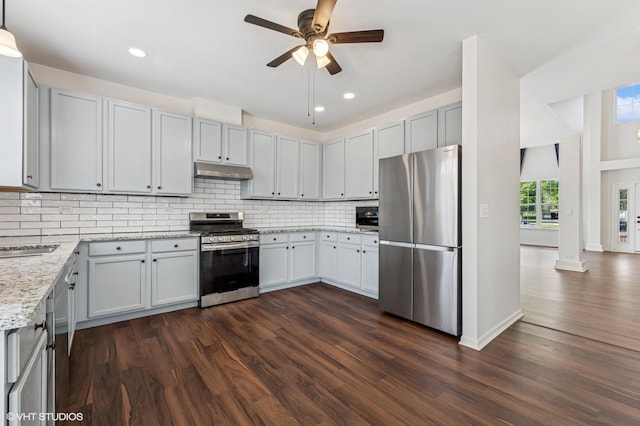955 S Roxbury Ct, Round Lake, IL 60073 - kitchen with stainless steel appliances, under cabinet range hood, ceiling fan, dark wood-style floors, and recessed lighting