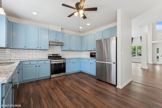 955 S Roxbury Ct, Round Lake, IL 60073 - kitchen with stainless steel appliances, blue cabinets, under cabinet range hood, dark wood-type flooring, and recessed lighting