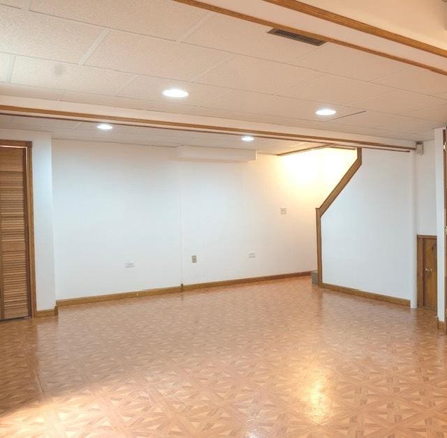 1413 N Metropolitan Ave, Waukegan, IL 60085 - finished basement with recessed lighting, baseboards, and a drop ceiling