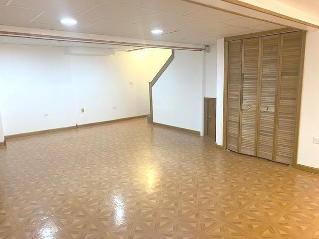 1413 N Metropolitan Ave, Waukegan, IL 60085 - finished basement with baseboards, a paneled ceiling, and recessed lighting