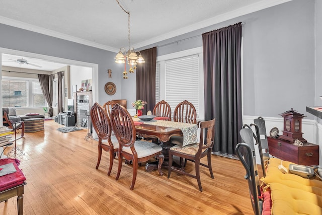 6210 N Francisco Ave, Chicago, IL 60659 - dining space featuring ornamental molding, light wood-style flooring, and a ceiling fan