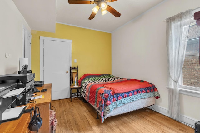 6210 N Francisco Ave, Chicago, IL 60659 - bedroom featuring wood finished floors, multiple windows, ceiling fan, and ornamental molding