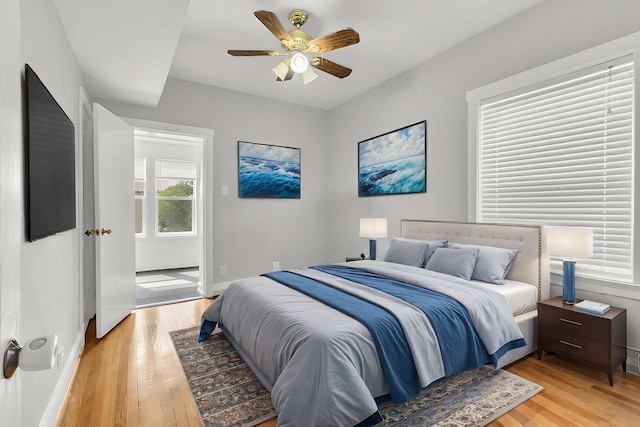 6210 N Francisco Ave, Chicago, IL 60659 - bedroom featuring light wood-type flooring, baseboards, and ceiling fan
