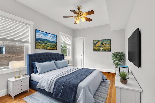 6210 N Francisco Ave, Chicago, IL 60659 - bedroom featuring light wood-style flooring, baseboards, and ceiling fan