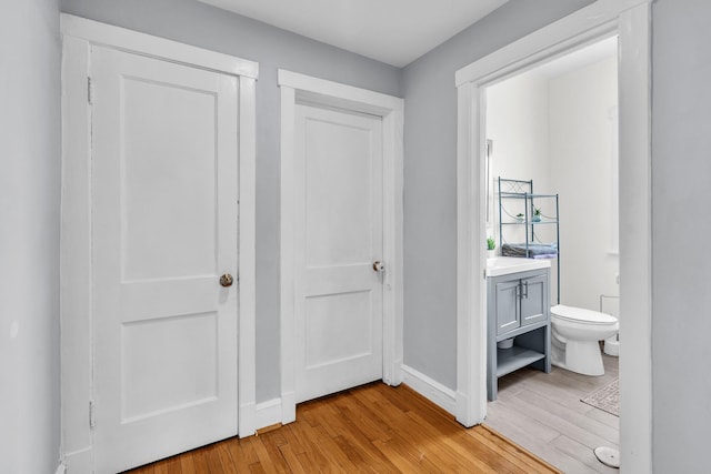 6210 N Francisco Ave, Chicago, IL 60659 - hallway with light wood-type flooring and baseboards