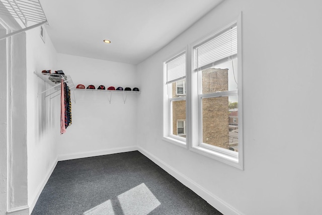 6210 N Francisco Ave, Chicago, IL 60659 - walk in closet featuring dark carpet