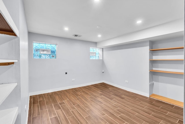 6210 N Francisco Ave, Chicago, IL 60659 - below grade area with wood finished floors, baseboards, and recessed lighting