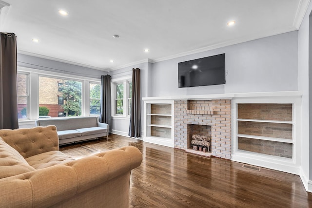 6210 N Francisco Ave, Chicago, IL 60659 - living area with crown molding, wood finished floors, baseboards, a fireplace, and recessed lighting